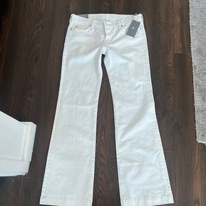 White bell bottom low rise jeans